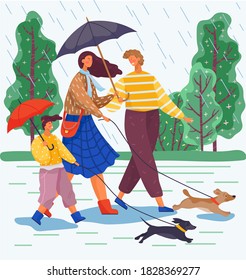Happy family day walk with dogs in the park. Mom, dad and their daughter go out for a walk in the rain with the dogs and take umbrellas with them. Terrible lousy rainy weather during family weekend