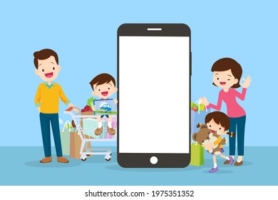 Happy Family Doing Grocery Shopping Online With A Mobile App On Their Smartphone.shopping Cart With Products And Family Is Making The Payment Online.