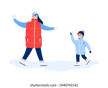 Happy family have fun playing snowball fight during winter holiday.