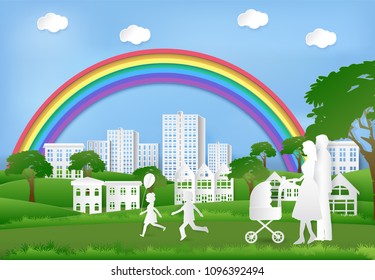 Happy family having fun in the park and rainbow on blue sky, Paper art background  paper cut illustration