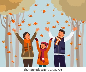 Happy Family Having Fun And Playing With Autumn Leaves In Park. Autumn Landscape Background