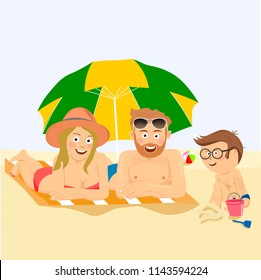 Happy family lying on the tropical beach under umbrella