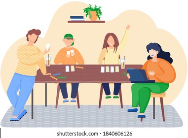 Happy family mother, father, son and daughter sitting at table and playing cards or tabletop game, spending time together at home. Family fun activity. Indoor entertainment for adults and children