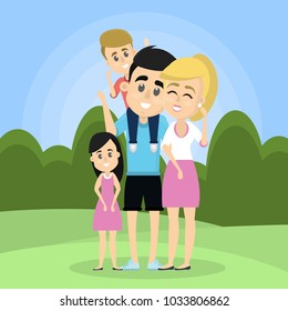 Happy family outside standing together and smiling.