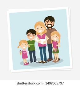 Happy family photo with parents, three children and babyborn
