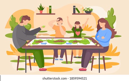 Happy family sitting on chairs at a table and playing board game with chips. Father, mother, son and daughter in living room interior at home. Parents and children spending evening time together