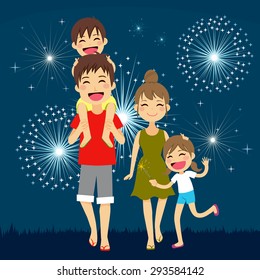 Happy Family Walking Together On Summer Holiday Night With Fireworks In The Background