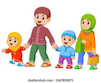 A happy family are walking together with their new clothes for celebrating ied mubarak