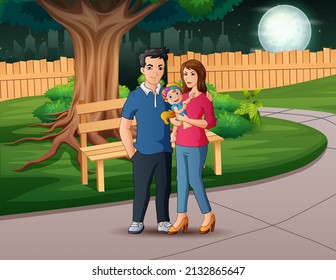 Happy family walks in park at night