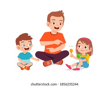 happy father give candy and sweets to his boy and girl kid