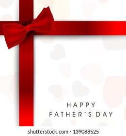 Happy Fathers Day card or background with red ribbon.