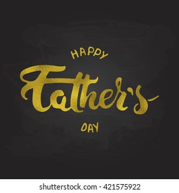 Happy Father's day gold foil lettering calligraphy greeting card isolated on the black
chalkboard background. Illustration for Fathers Day invitations. Dad's day lettering.