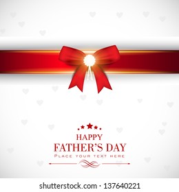 Happy Fathers Day greeting card with red ribbon.