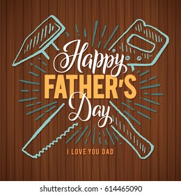 Happy Father's Day! Greeting Retro Card. A Hammer and Saw, the Dad's Tools. Wood Background