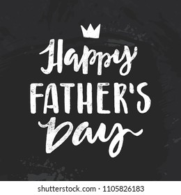 Happy fathers day handwritten lettering. Vector calligraphy with a brush on black chalkboard imitation for your design.