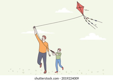 Happy fathers day and leisure concept. Smiling positive man parent dad and his son playing with flying kite together outdoors on sunny summer day vector illustration 