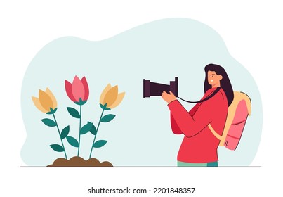 Happy female blogger taking photo of beautiful flowers. Woman holding camera in front of plants flat vector illustration. Photography, botany, biology, blogging concept for banner or landing web page