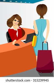 happy female receptionist sitting at hotel counter and woman with travel suitcase standing near her