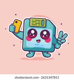 happy floppy disk character mascot taking a selfie with a smartphone isolated cartoon 