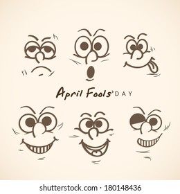 Happy Fool's Day funky concept with funny faces set on abstract background.