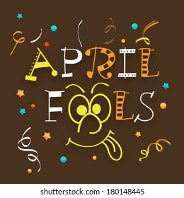 Happy Fool's Day funky concept with colorful text on brown background.