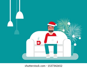happy freelancer man with santa hat on sofa with laptop. creative hipster work at home. flat vector illustration winter background. outsourcer with computer. Christmas cozy workplace