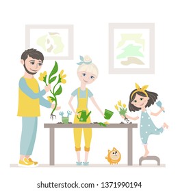 Happy friendly family. Mom, dad and daughter plant flowers together. Housework in a joyful mood.