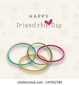 Happy Friendship Day background with friendship bands.