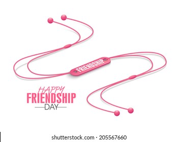 Happy Friendship Day celebrations concept with pink wrist band on white background. 