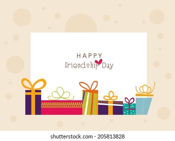 Happy Friendship Day celebrations greeting card with colorful gift boxes on beige background. 