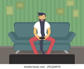 Happy gamer sitting at home and playing video games over time