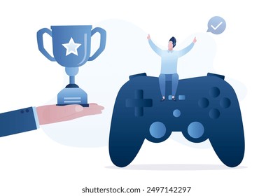 Jugador feliz sentado en el joystick grande, la mano da la taza grande del ganador. Premio en torneo de e-sport. Jugador profesional, personaje masculino con premio. Deporte cibernético, desafío en línea, concepto. Ilustración vectorial de moda