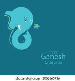 Happy Ganesh Chaturthi beautyful Lord Ganesha head in blue color with lotus and english typography on blue  color background.