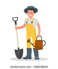 Happy gardener man with a shovel and watering can on a white background.