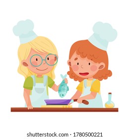 Happy Girl Chef Characters Wearing Apron and Hat Frying Fish on Frying Pan Vector Illustration
