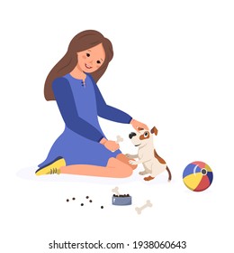 La chica feliz le da un hueso a un cachorro. Juego infantil con un perro. Cuidando a las mascotas por su dueño. Ilustración plana del vector