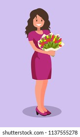 Happy girl holding a bouquet of flowers.