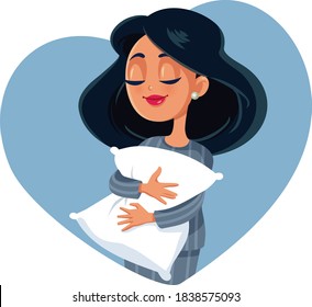 Happy Girl Holding a Pillow Ready for Sleeping. Serene sleepy woman hugging a cushion relaxing
