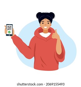 Happy girl holds phone in her hands and shows class. Health passport on smartphone. Electronic certificate of vaccination. Mobile screen with qr code.