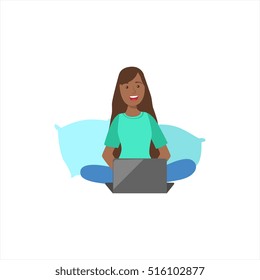 Happy Girl In Pajamas Sitting With Her Legs Crossed On The Bed With Lap Top, Part Of Women Different Lifestyles Collection