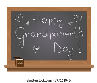 Happy grand parent's day text on a school blackboard written with chalk.