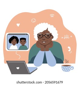 Happy grandma with laptop communicates with grandchildren.   Old lady in glasses siiting on the table. Vector illustration.