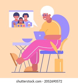 Happy grandma with laptop has communication with her family by video call. Granny has online chat with grandchild