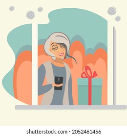 The happy grandmother received a gift from her grandchildren and thanks them on the phone. Outside the window, golden autumn. Elderly woman in a cozy home on isolation. Flat vector in orange colors.