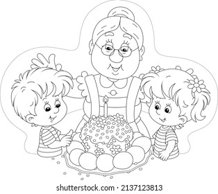 Happy granny and little kids at their festive table with a traditional sweet holiday cake and painted Easter eggs, black and white outline vector cartoon illustration for a coloring book page