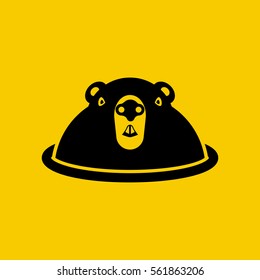 Happy Groundhog Day. Funny cute marmot looking out of a burrow, silhouette. Rodent, black icon isolated on yellow background. Pictogram  woodchuck. Vector illustration flat design.