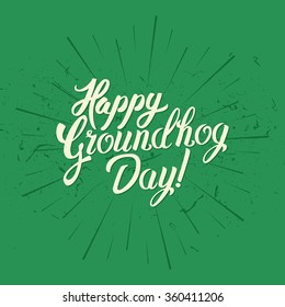 Happy Groundhog Day! Hand Lettering Vintage Text with Sunbursts Graphic Elements Isolated on Green Background For Your Design. Vector Illustration