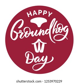 Happy groundhog day - hand-written text, words, typography, calligraphy, hand-lettering. Vector hand-writing emblem, for label, title, round red banner