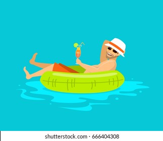 happy guy floating in inflatable ring in the swimming pool, drinking cocktail, enjoying summer time, vacation, holidays