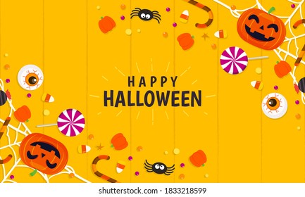 Happy Halloween Background Vector Illustration. Top View Of Halloween Candies On Orange Table Background.